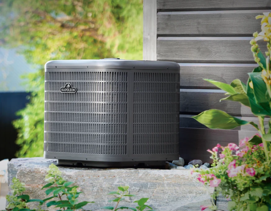 Napoleon central air conditioner condenser unit installed beside a home
